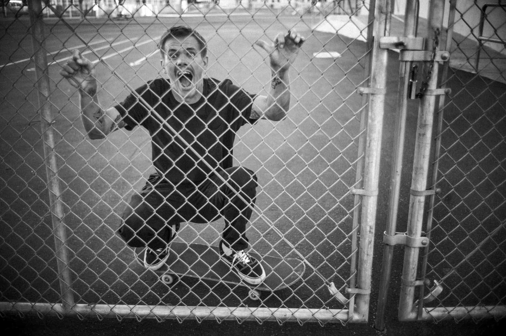 GEOFF_ROWLEY_BEHIND_FENCE